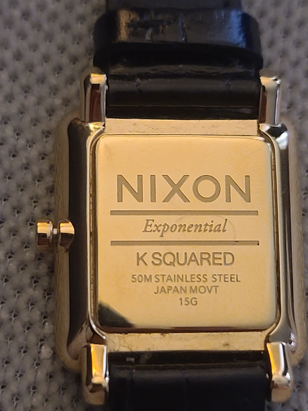 Nixon Gold-Tone Rectangular Exponential K Squared Watch with Black Strap